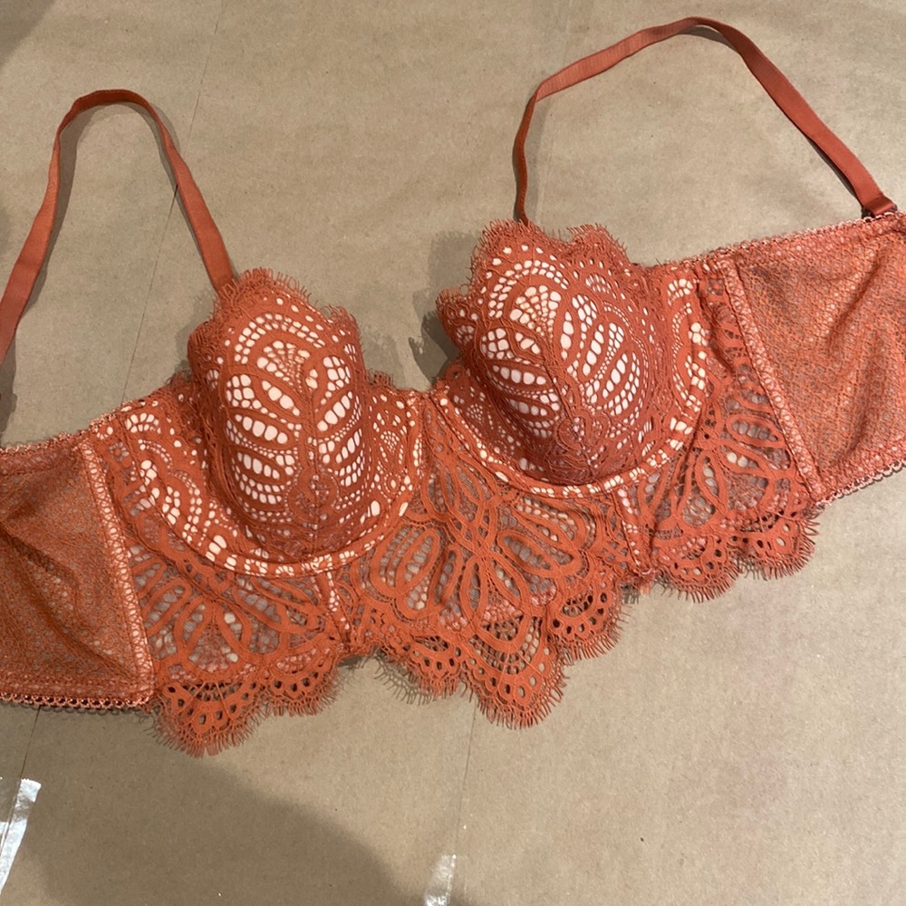 Victoria’s Secret burnt orange colored/ Lacey details bra